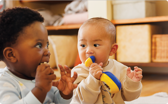 parent playing with baby